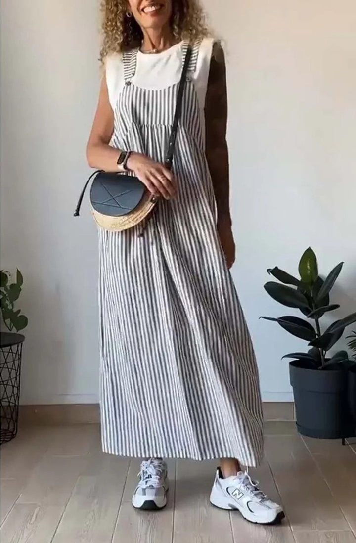Spalline larghe e design senza maniche dell'abito maxi pinafore a righe, vestibilità comoda e chic.