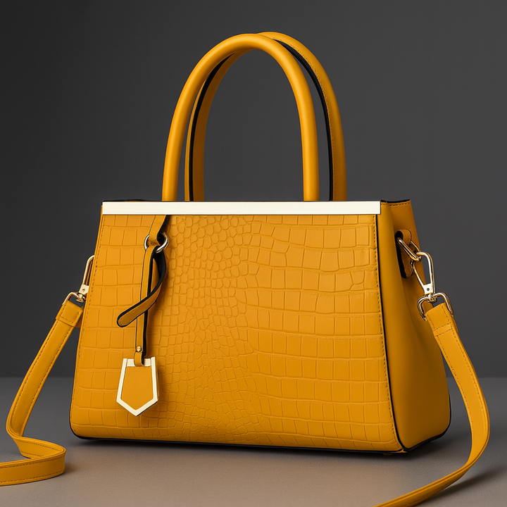Accessorio moda: borsa a mano da donna in pelle effetto coccodrillo, un regalo elegante e raffinato.
