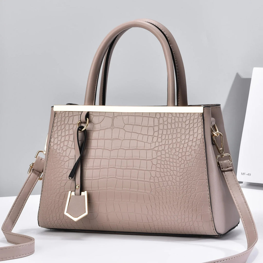 Borsa elegante da donna, in pelle effetto coccodrillo, con design classico e hardware dorato lucido.