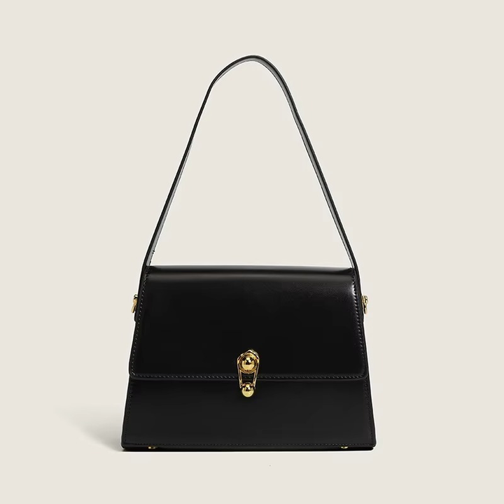 Elegante borsa a tracolla rossa da donna in ecopelle strutturata con cerniera e dettagli hardware oro.