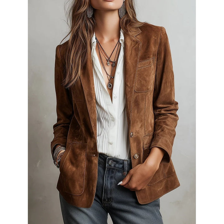 Elegante blazer da donna sartoriale monopetto marrone con spalle strutturate, perfetto per ufficio e look casual.