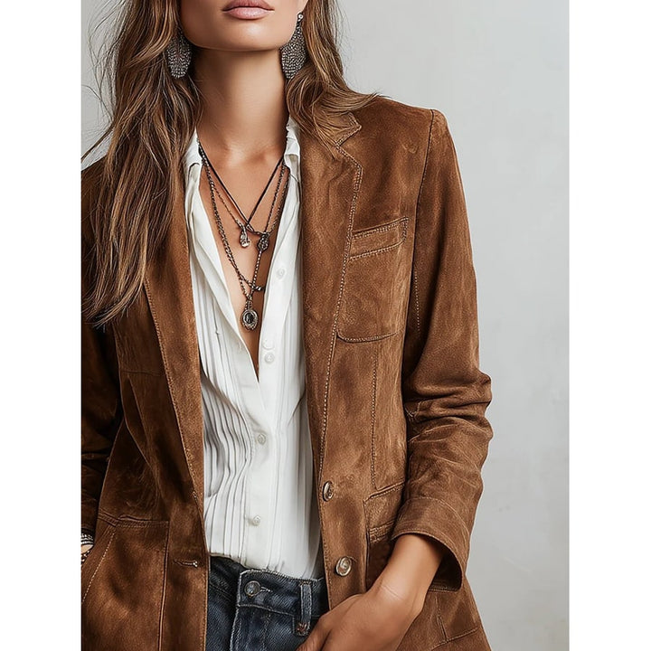 Moda donna: blazer monopetto elegante marrone, perfetto per l'ufficio o un outfit casual-chic primaverile.
