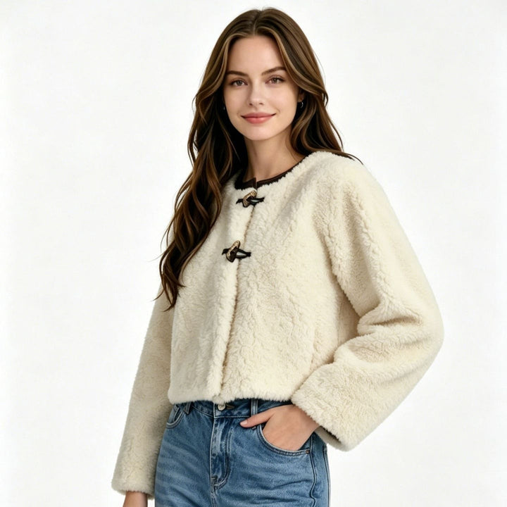 Elegante giacca corta donna autunnale con chiusura alamari. Un capo femminile caldo e di stile unico per il tuo inverno.