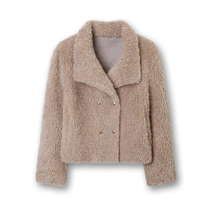 Giacca donna teddy corta e confortevole. Modello doppiopetto con bottoni dorati, un capo must-have per la moda invernale.