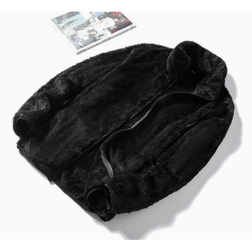Abbigliamento donna: giacca moda in pile teddy, collo alto e zip intera, per un look casual autunnale.