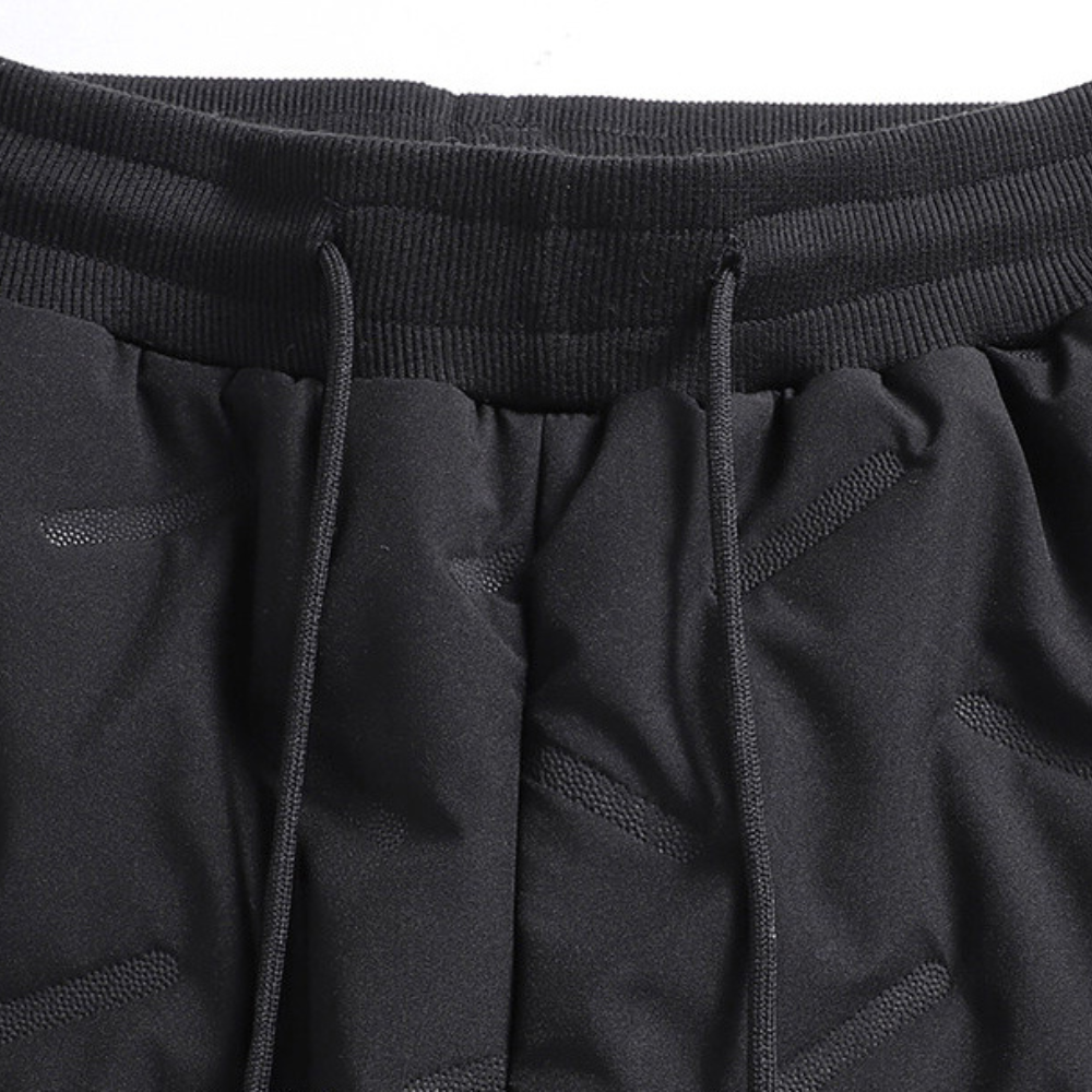 Pantaloni sportivi da donna, impermeabili e caldi, ideali per jogging e attività outdoor invernali.