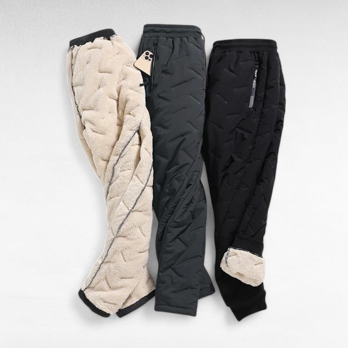 Pantaloni neri impermeabili da donna con coulisse, ottimi per neve, pioggia e sport invernali.