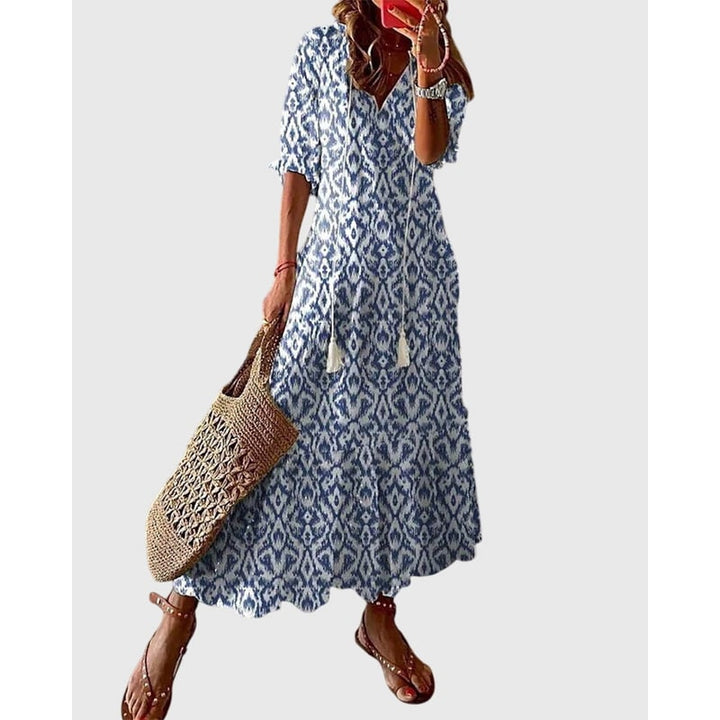Vestito lungo boho da donna estivo con scollo a V e balze. Ideale per spiaggia, vacanza o outfit casual.