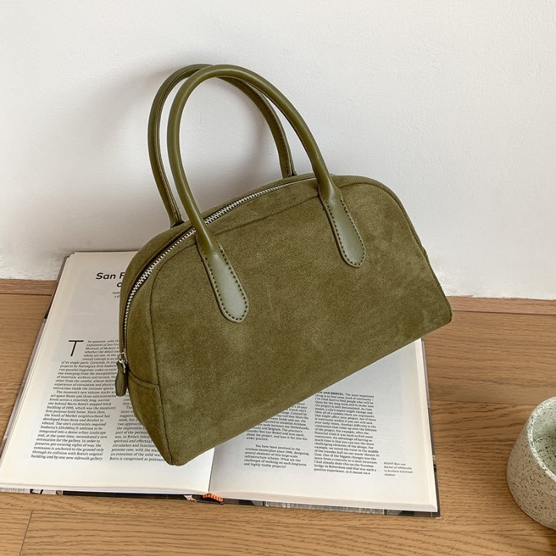 Borsa a mano donna strutturata, disponibile in vari colori. Borsa quotidiana con chiusura a zip, design classico.