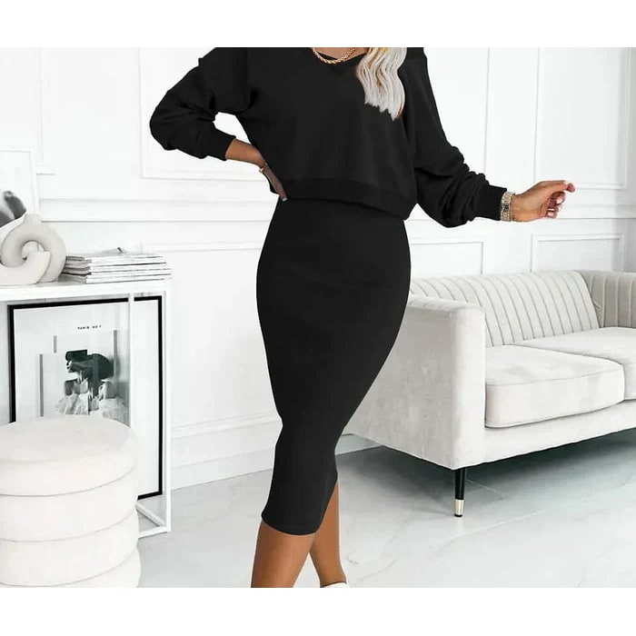 Completo midi due pezzi donna elegante, abito aderente senza maniche e top corto. Perfetto per ogni occasione.