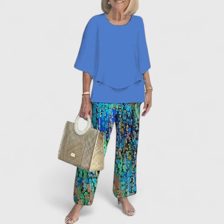 Completo pantaloni donna, tunica a strati e collo rotondo. Moda versatile e confortevole per lei.