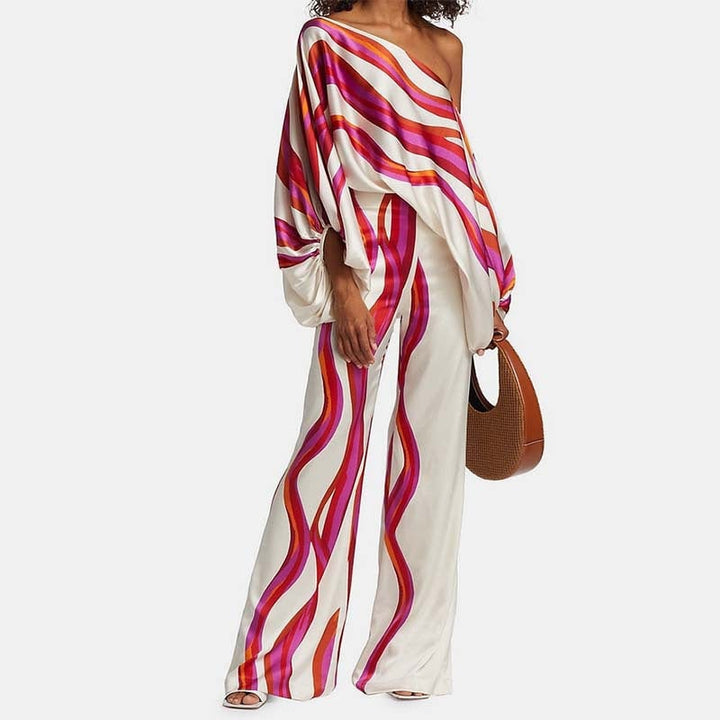 Completo donna elegante due pezzi: top spalle scoperte e pantaloni larghi. Ideale per l'estate.