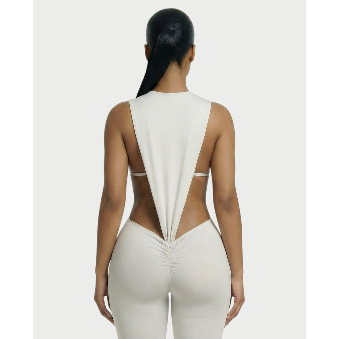 Completo due pezzi: Body aderente scolpito e leggings a vita alta arricciati, per una silhouette perfetta.