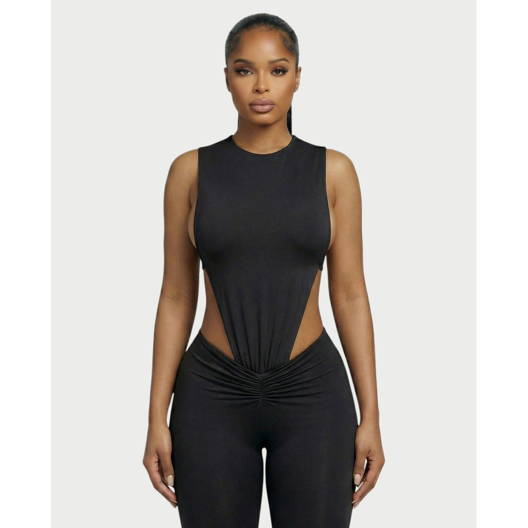 Outfit sportivo donna: Body modellante aderente e leggings a vita alta con arricciature, per comfort e stile.