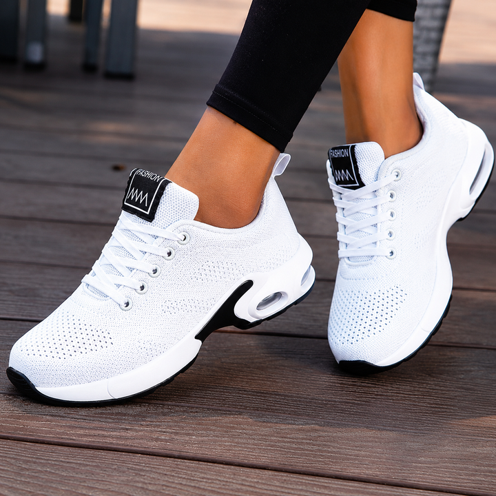 Scarpe da passeggio donna leggere con ammortizzazione ad aria per comfort quotidiano e lunghe camminate.