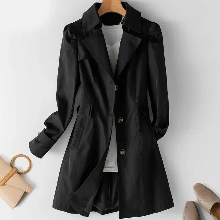 Cappotto trench donna idrorepellente, stile classico ed elegante. Perfetto per look casual o formale, autunno/primavera.
