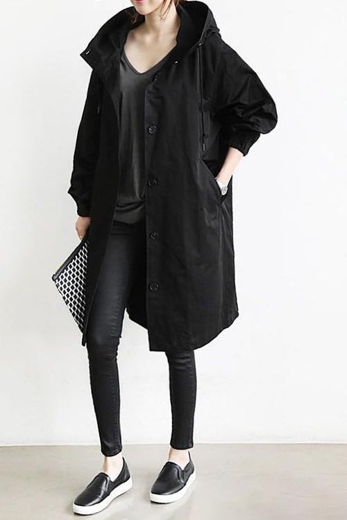 Cappotto trench leggero impermeabile da donna, ideale per un look versatile in autunno.