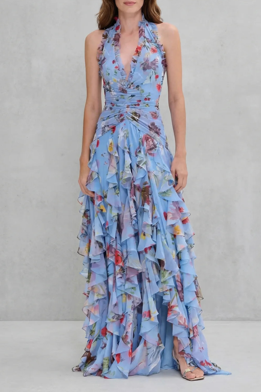 Abito donna lungo floreale con scollo all'americana e balze. Ideale per cerimonie estive e occasioni speciali.