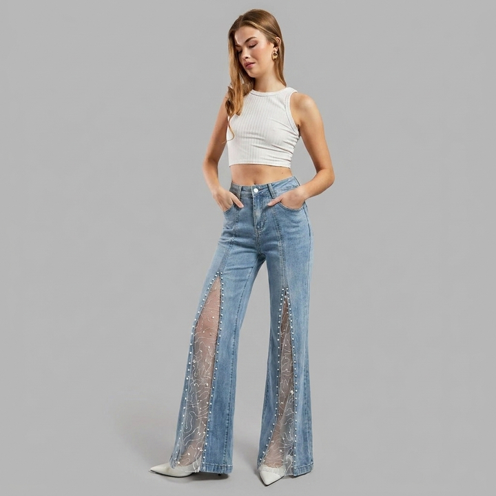 Pantaloni jeans donna baggy vita alta, con dettagli in rete. Ideali per uno stile casual chic e un look di tendenza.