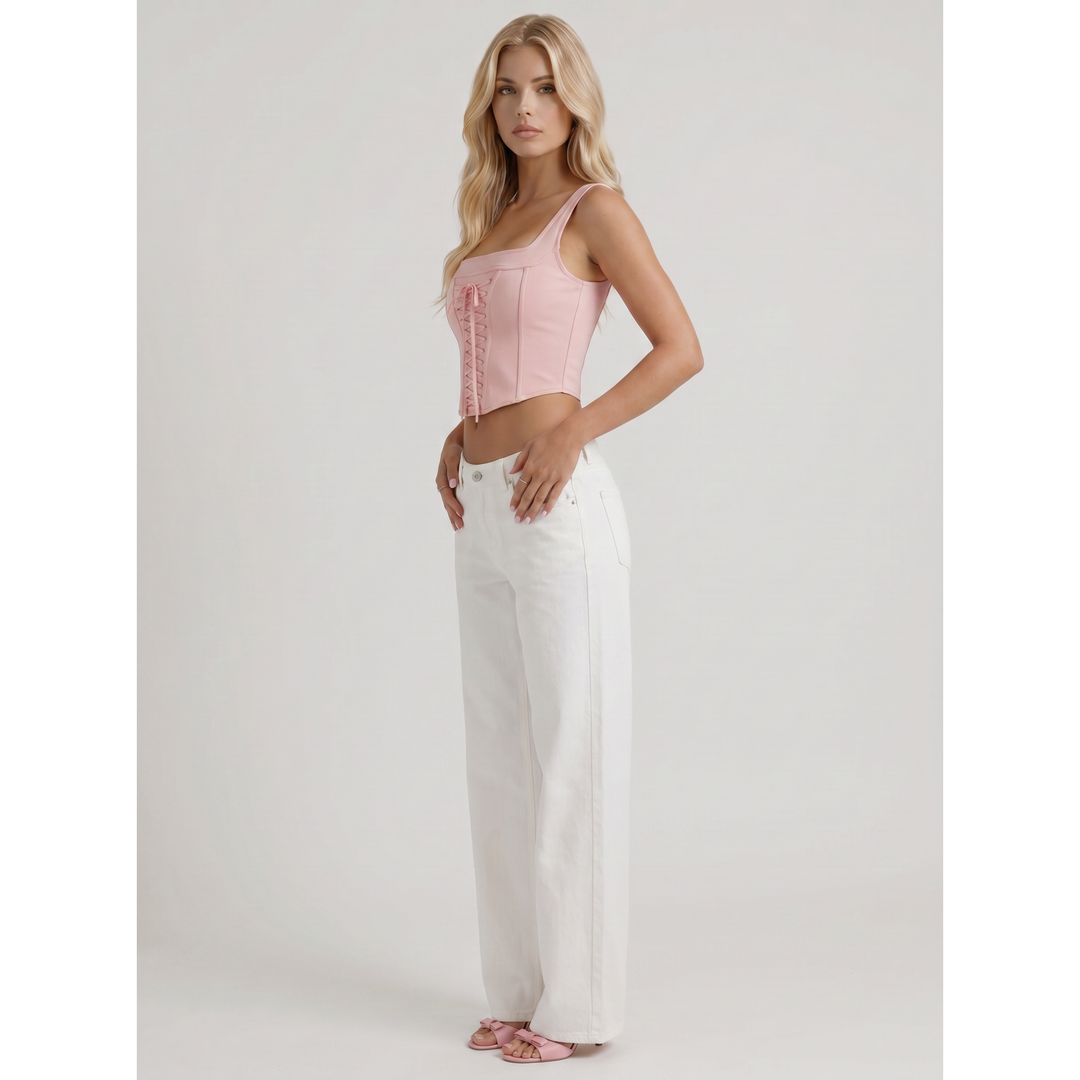 Jeans donna a gamba larga, vita media, con delicato ricamo fiore. Moda donna per un look fresco e di tendenza.