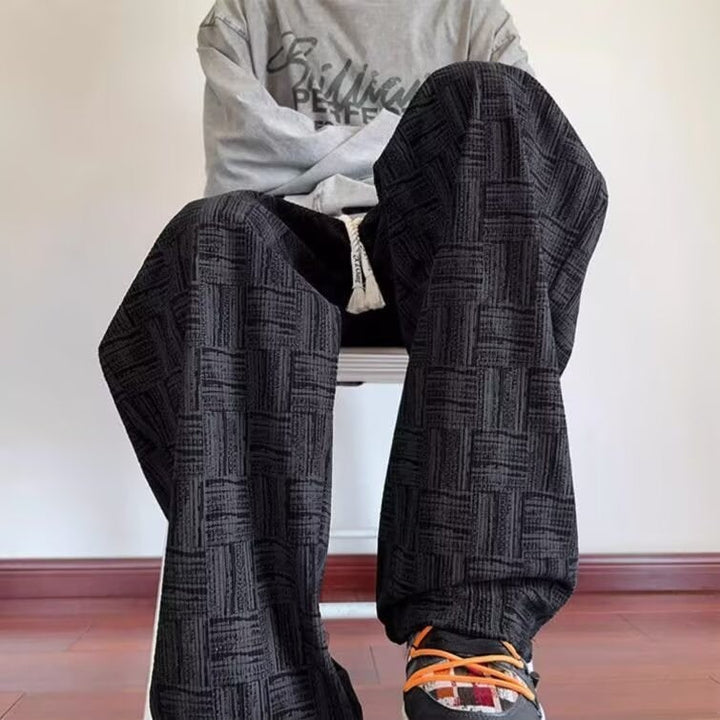 Pantaloni larghi donna con vita elastica e coulisse, stile fluido per comfort casual o elegante.
