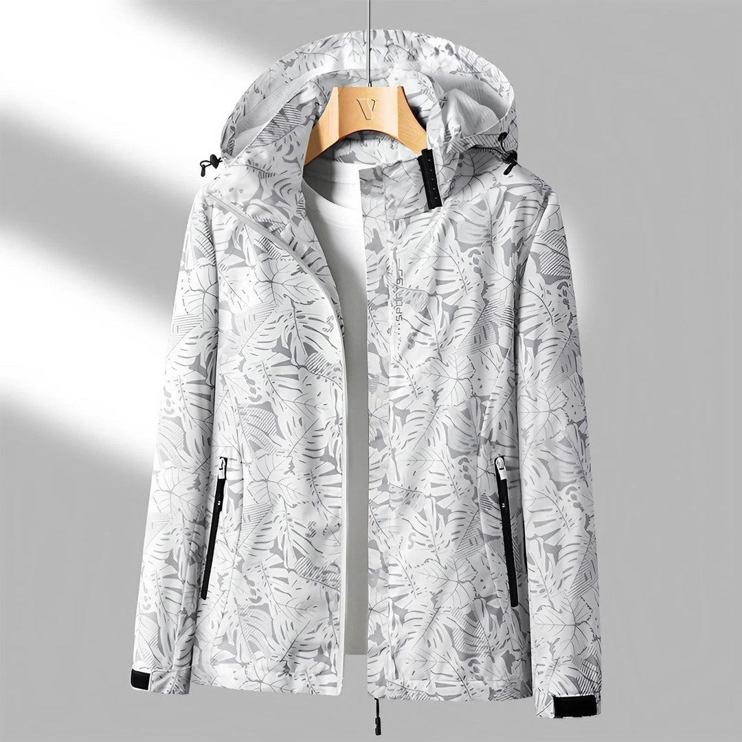 Giacca donna casual antipioggia con motivo foglie, perfetta per viaggi e attività esterne, leggera.
