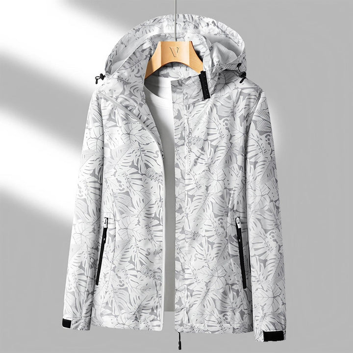 Giacca donna casual antipioggia con motivo foglie, perfetta per viaggi e attività esterne, leggera.