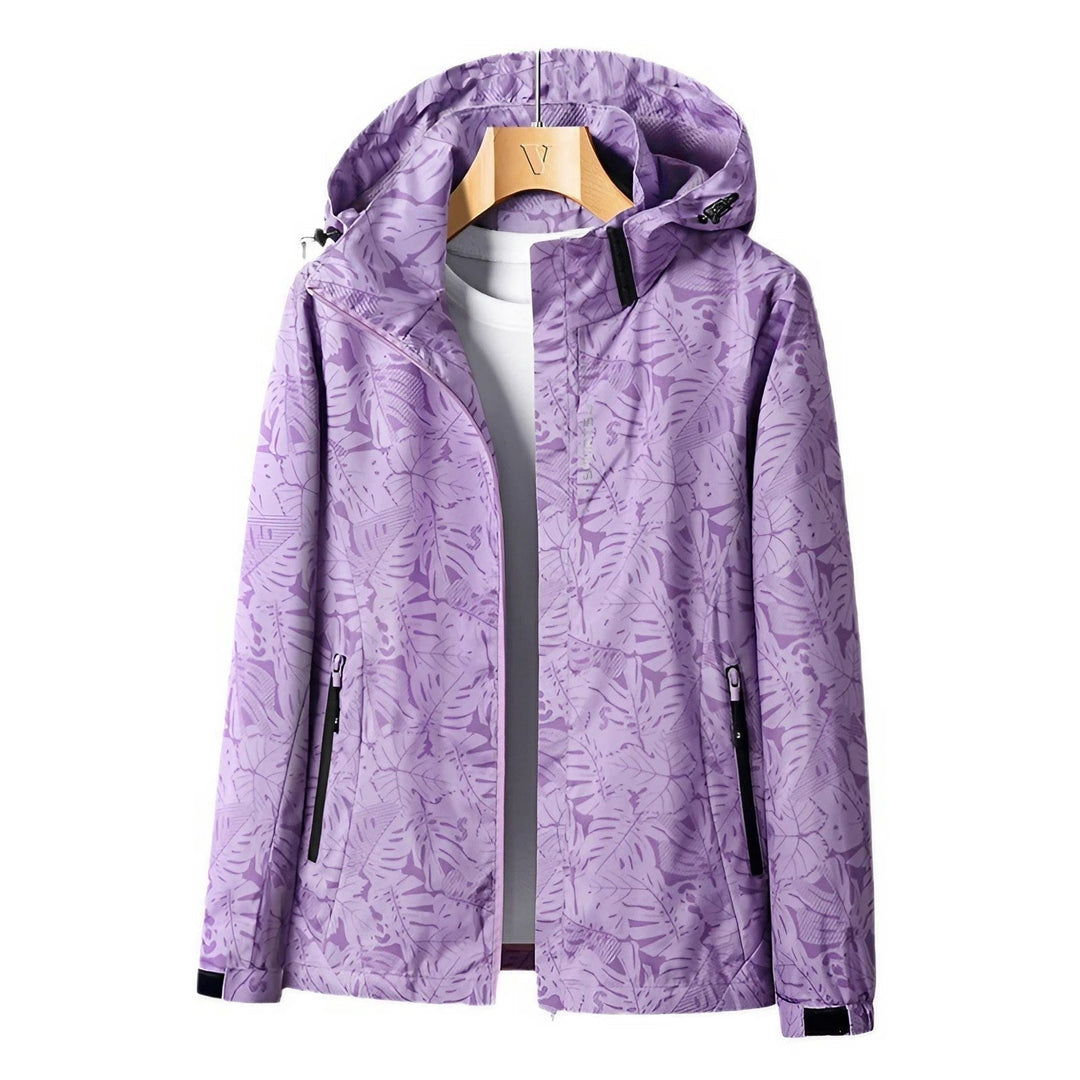 Giacca antipioggia impermeabile donna con cappuccio e stampa foglie, protezione leggera per l'esterno.