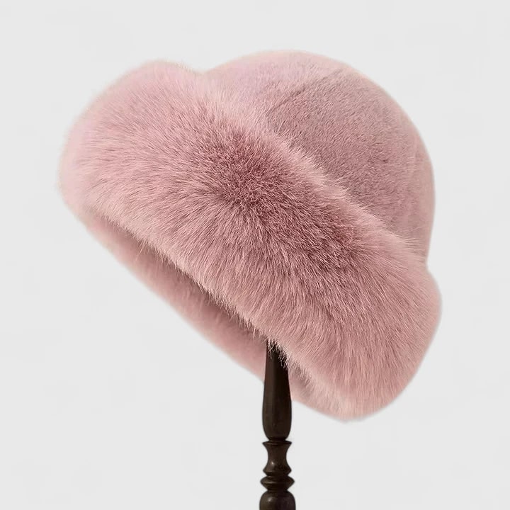 Cappello invernale donna in pelliccia sintetica, caldo e morbido, con bordo per un look elegante. Perfetto per l'inverno.