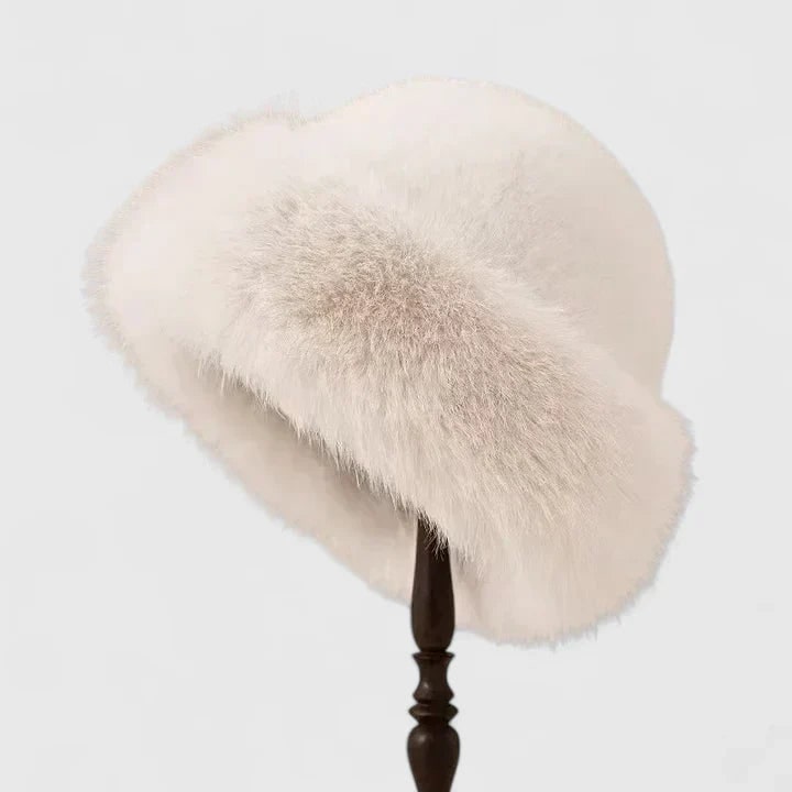 Cappello invernale da donna con bordo morbido in pelliccia sintetica, ideale per il freddo e per un tocco di stile chic.
