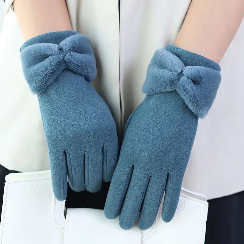 Eleganti guanti invernali donna in pile, con fiocco pelliccia sintetica. Caldi, alla moda e touchscreen per l'inverno.