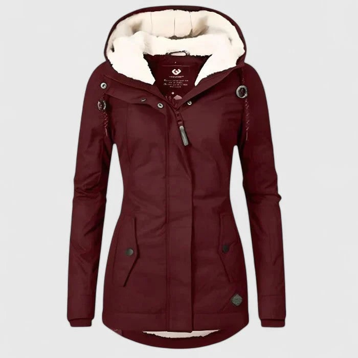 Dettaglio schiena giacca donna impermeabile, design moderno e confortevole, ideale per freddo e pioggia.