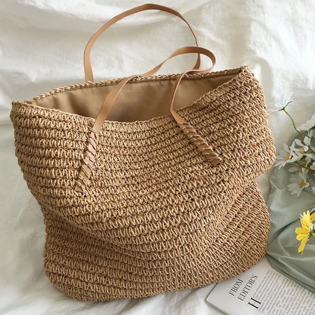 Borsa tote grande in paglia per donna, intreccio fine e tracolle in ecopelle. Funzionale ed elegante per ogni occasione.