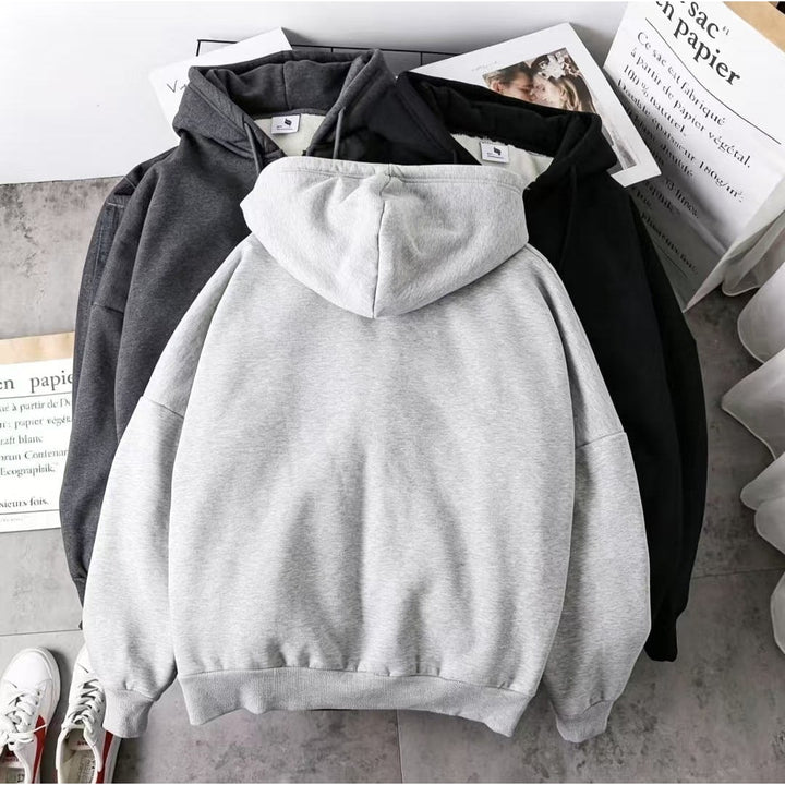 Felpa calda donna con cappuccio e cerniera, must-have per autunno e inverno. Comfort e stile casual.