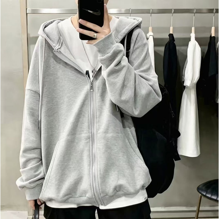 Felpa donna versatile con cappuccio e cerniera, perfetta per look casual e comfort nelle stagioni fredde.