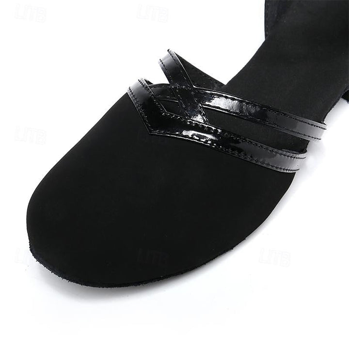 Scarpe da donna nere per ballo, versatili e comode. Design elegante, leggere e con tacco basso.