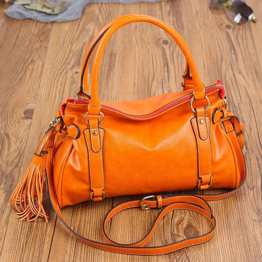 Borsa a mano donna nera, struttura definita, capiente, versatile, accessorio moda elegante quotidiano.