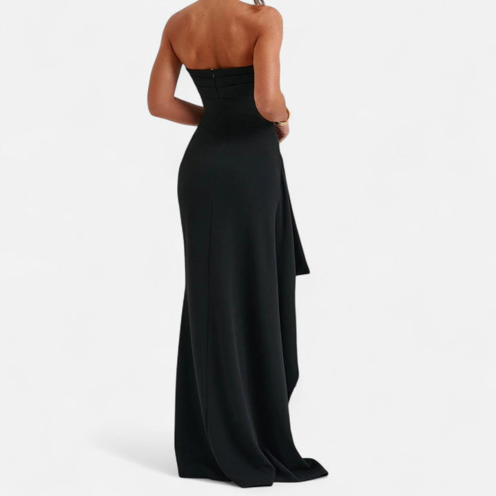 Abito da sera donna senza spalline, con bustier e spacco alto. Vestito elegante aderente per eventi formali.