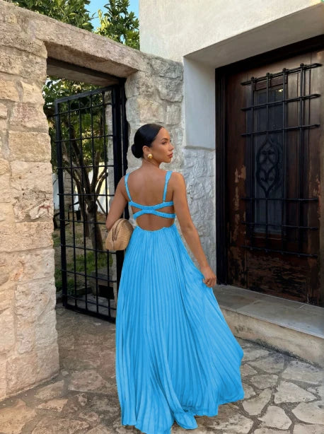 Abito lungo donna chic, con schiena scoperta e scollo a V, ideale per eventi serali, un must della moda elegante.