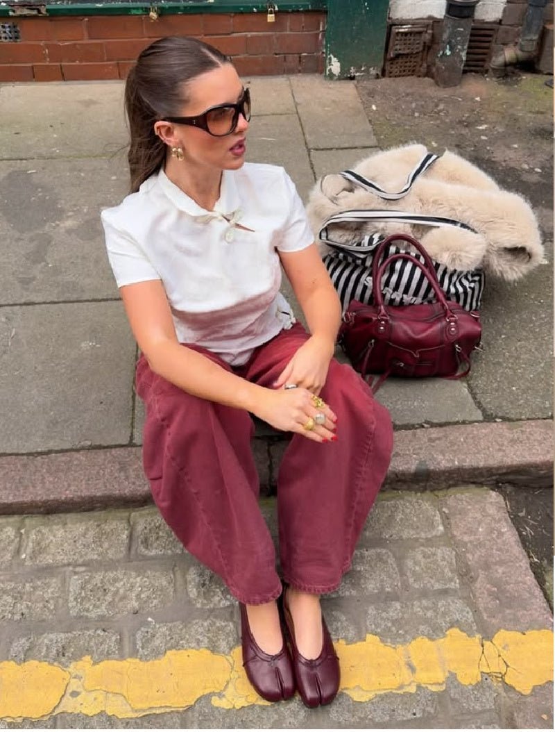 Scarpe mule da donna slip-on, eleganti e comode, con design a punta divisa.