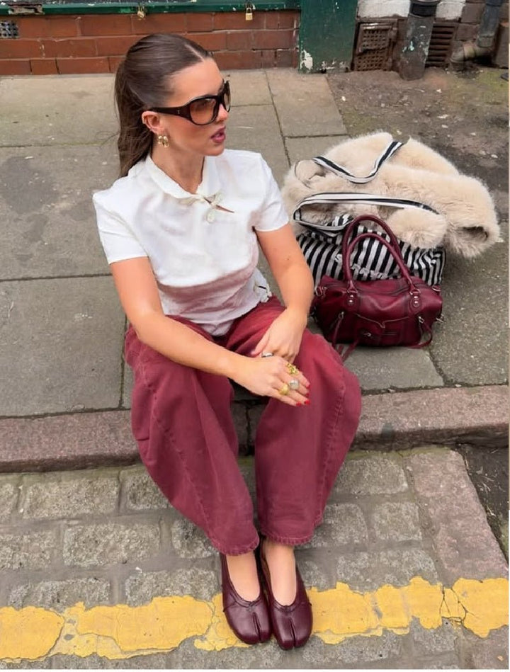 Scarpe mule da donna slip-on, eleganti e comode, con design a punta divisa.