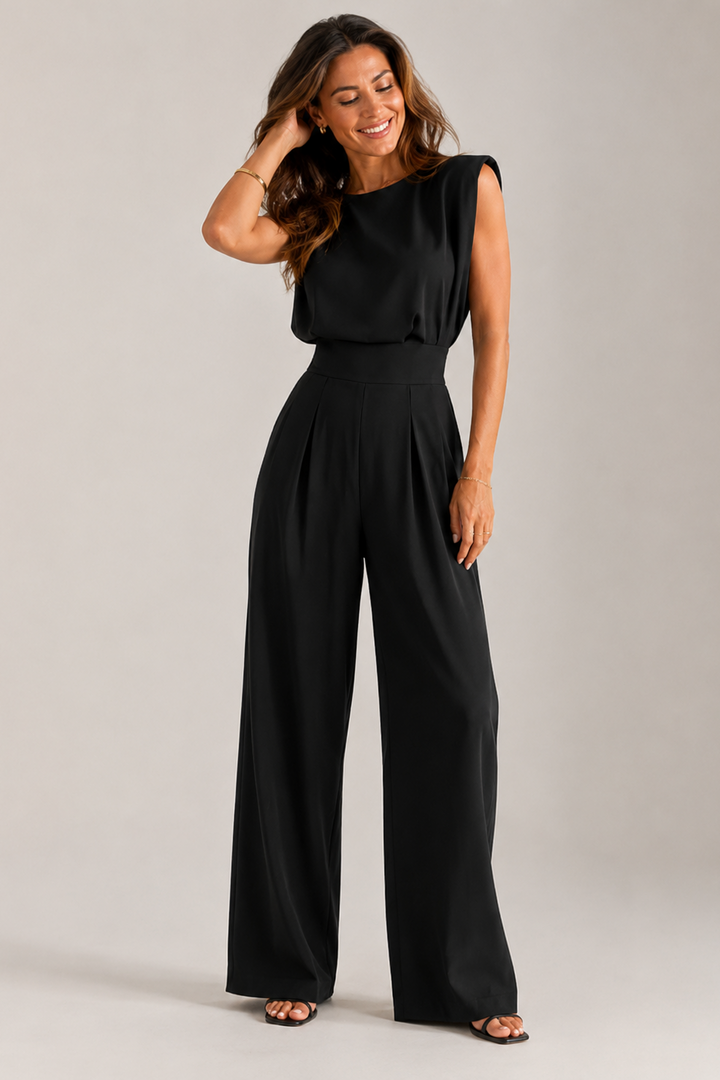 Tuta donna elegante senza maniche, fluida, perfetta per serate e abbigliamento femminile chic.